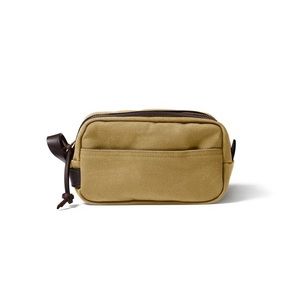 Filson rugged tan twill and leather Dopp kit.